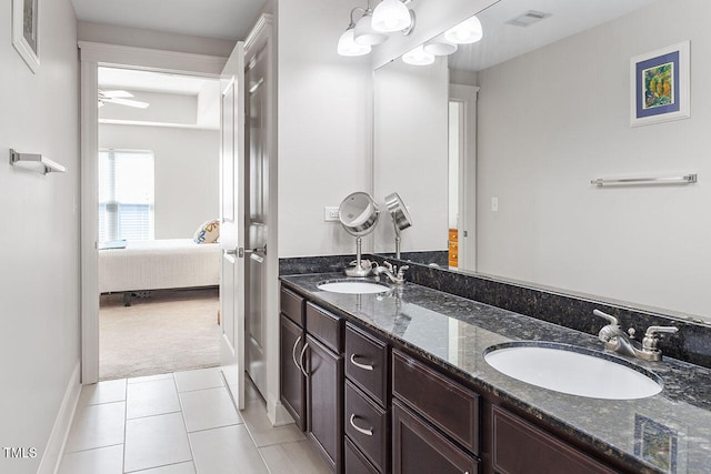 bathroom with vanity and tile patterned floors