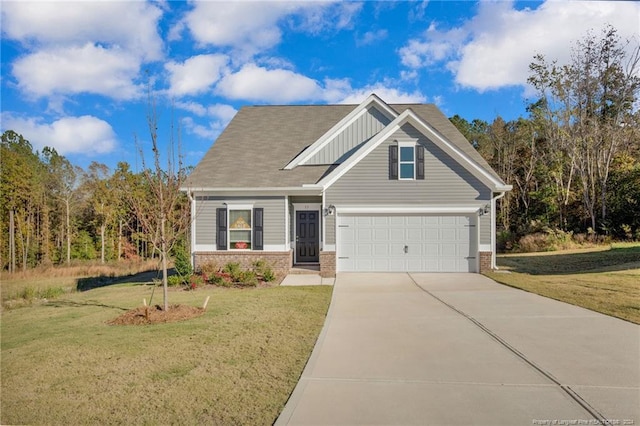 view of front facade with a front yard and a garage