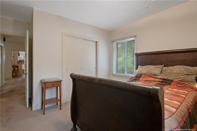 bedroom with light carpet