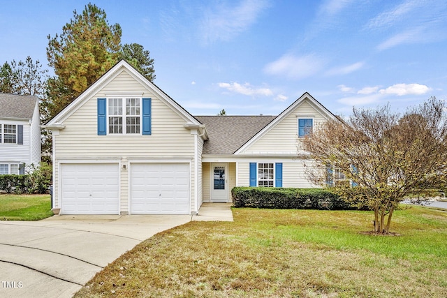 view of front facade with a garage and a front yard