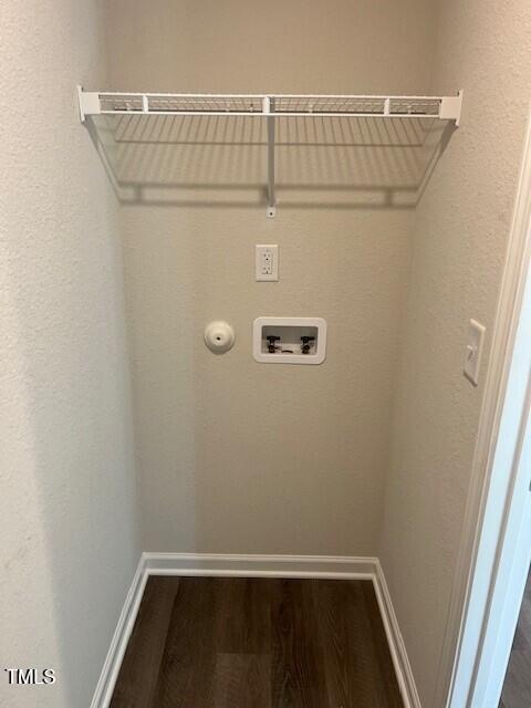 laundry room featuring hardwood / wood-style floors, gas dryer hookup, and hookup for a washing machine