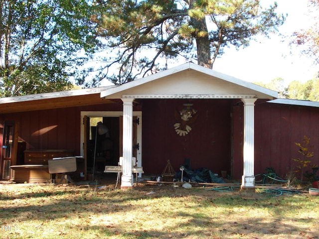 exterior space with a lawn