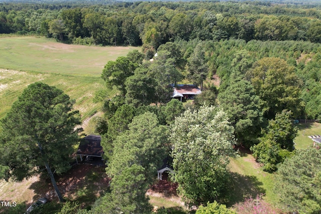 birds eye view of property with a rural view