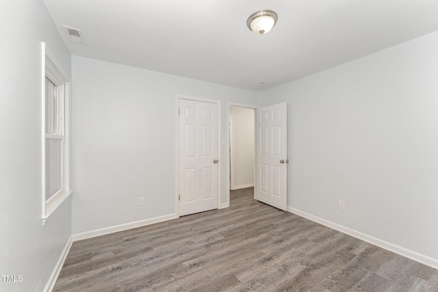 empty room with light wood-type flooring