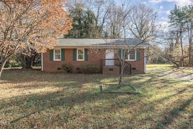 single story home with a front yard