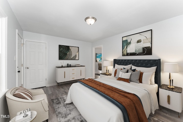 bedroom featuring dark hardwood / wood-style floors