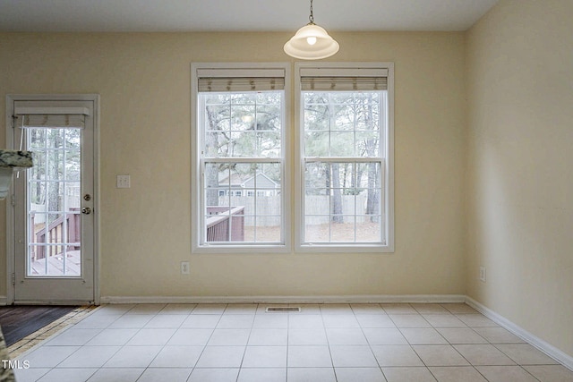 interior space featuring light tile patterned floors