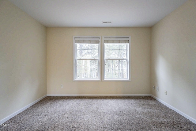 empty room with carpet floors