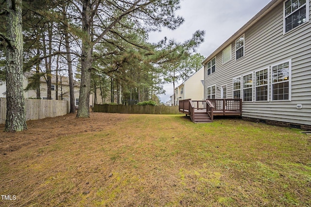 view of yard featuring a deck