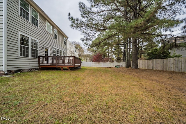 view of yard featuring a wooden deck