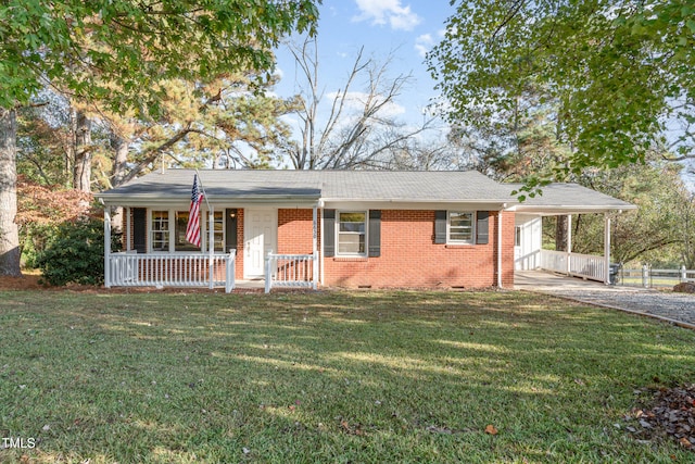 ranch-style house featuring a carport, a porch, and a front lawn