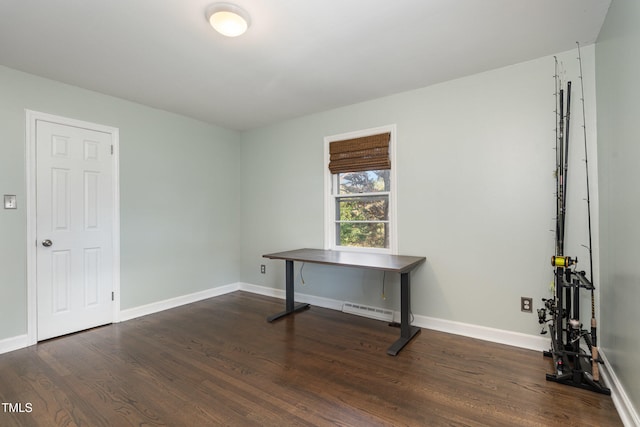 miscellaneous room featuring dark hardwood / wood-style flooring