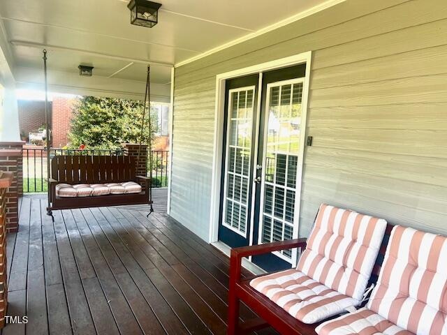 deck featuring covered porch