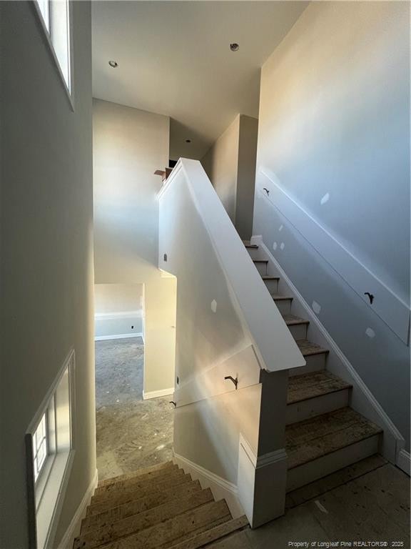 staircase with a healthy amount of sunlight