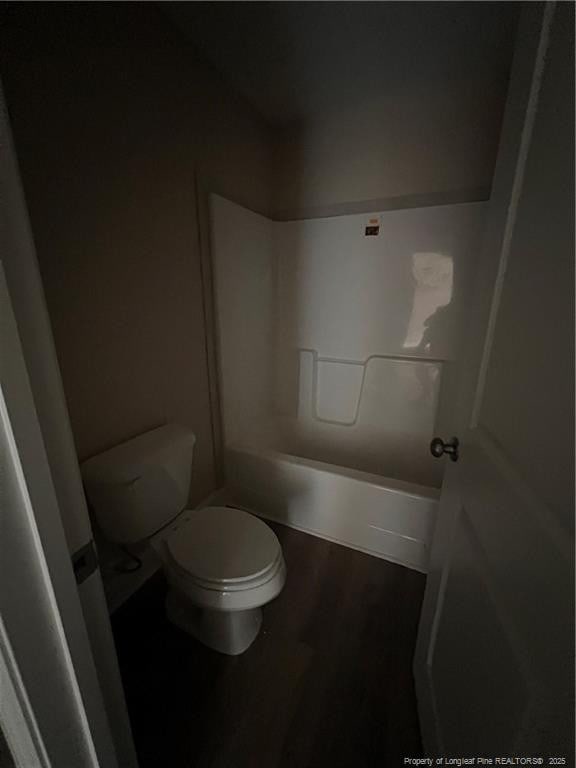 full bathroom featuring toilet and wood finished floors