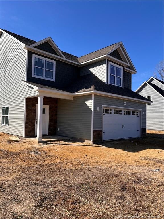 view of front of home featuring an attached garage