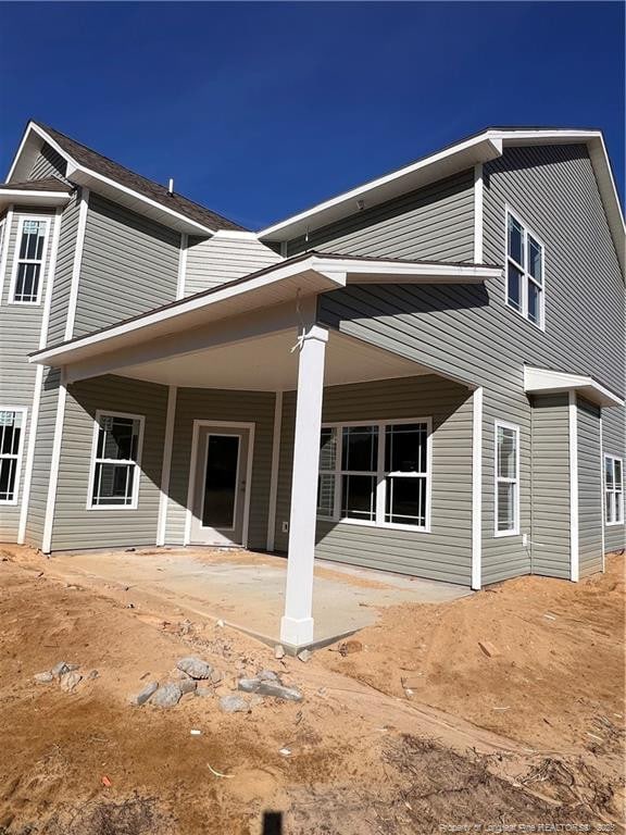 rear view of property with a patio area