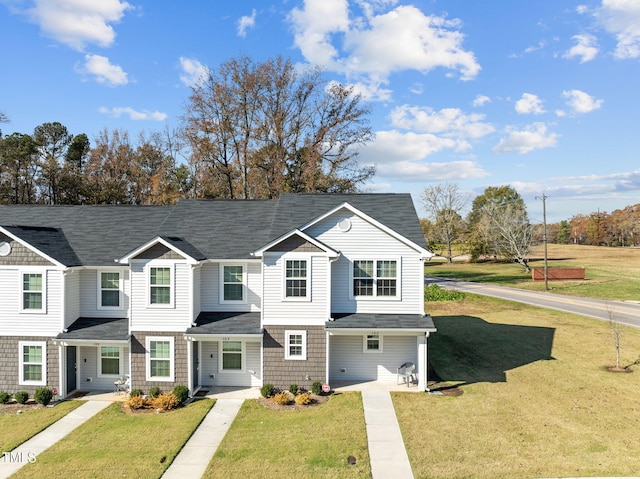 view of front of property with a front lawn