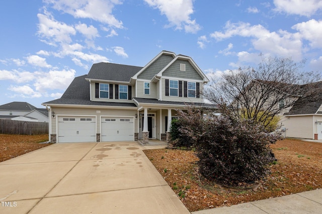 craftsman inspired home featuring a garage