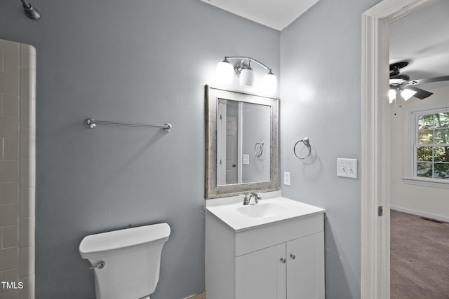 bathroom with ceiling fan, vanity, and toilet