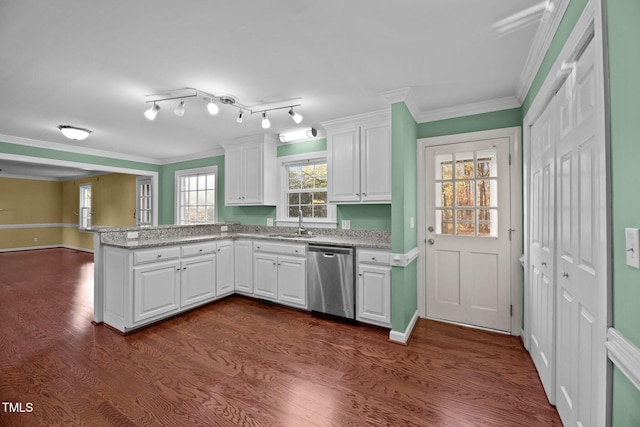 kitchen with stainless steel dishwasher, white cabinets, and dark wood-type flooring