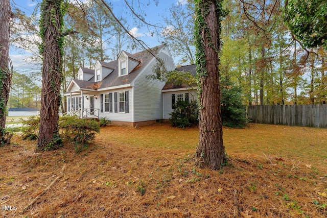 view of home's exterior featuring a lawn