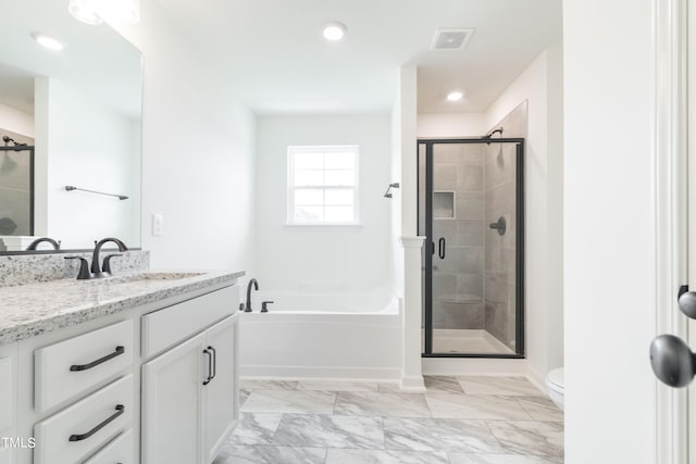 full bathroom with vanity, toilet, and plus walk in shower