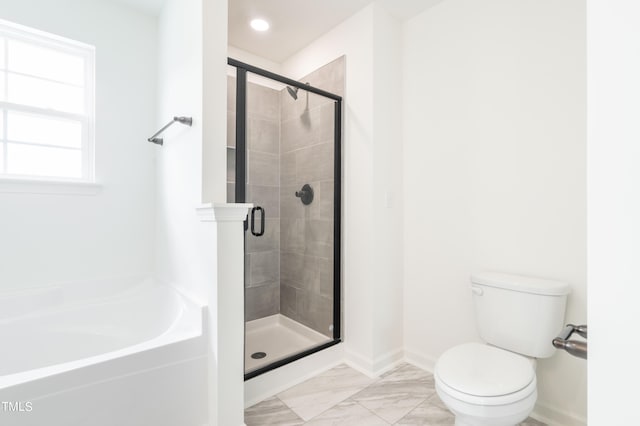 bathroom with toilet and plus walk in shower