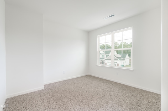 unfurnished room featuring carpet floors