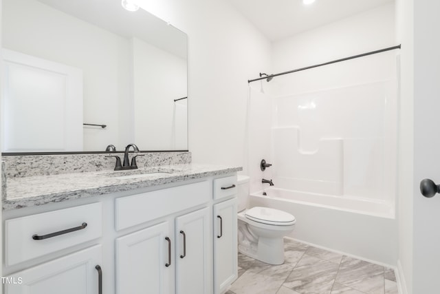 full bathroom featuring toilet, shower / bathing tub combination, and vanity