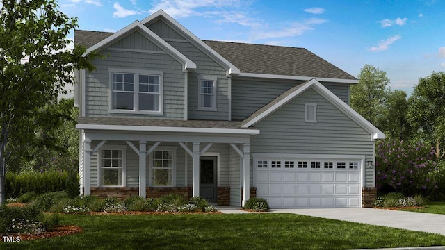 view of front of property with a garage and a front lawn