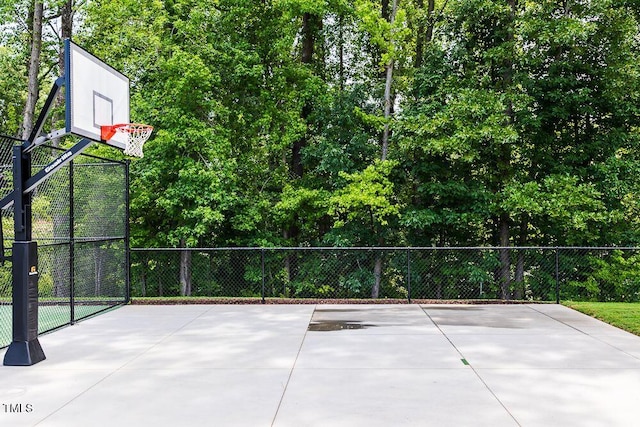 view of patio / terrace featuring basketball hoop