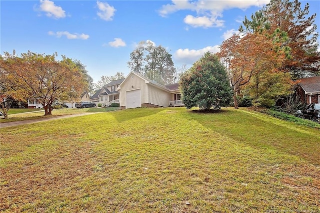 view of yard featuring a garage