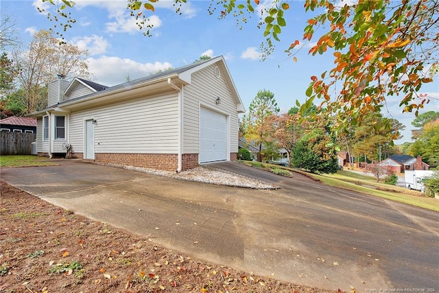 view of home's exterior with a garage