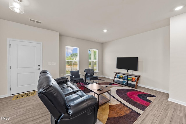 living room featuring light wood-type flooring