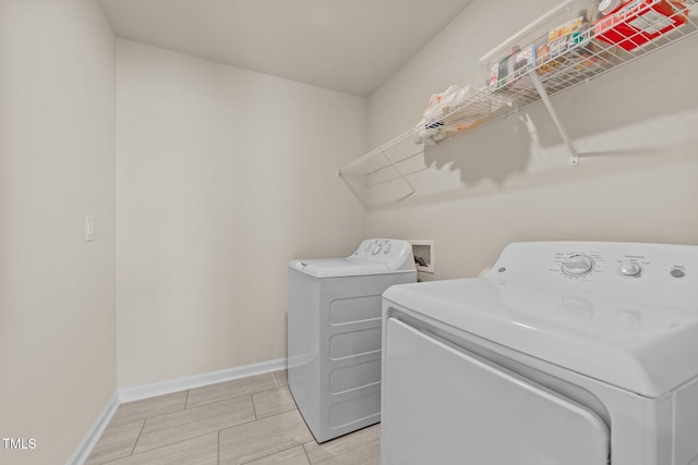 laundry room featuring independent washer and dryer