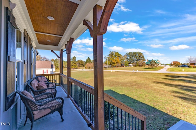 balcony featuring a porch