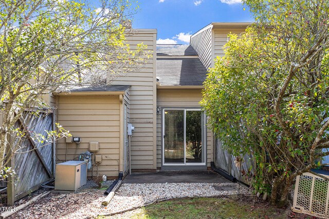 rear view of house featuring a patio