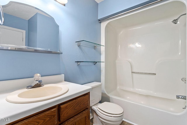 full bathroom featuring vanity, toilet, and shower / washtub combination