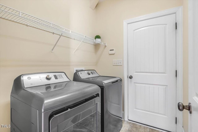 washroom featuring separate washer and dryer