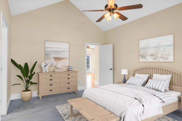 bedroom with carpet flooring, ceiling fan, and high vaulted ceiling