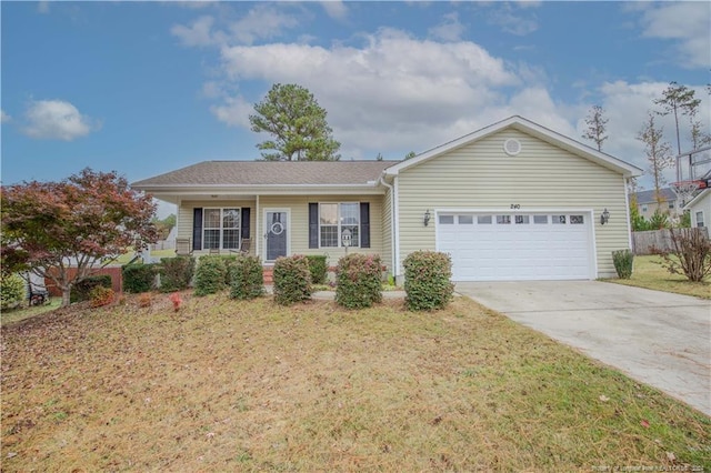 ranch-style home with a front lawn and a garage