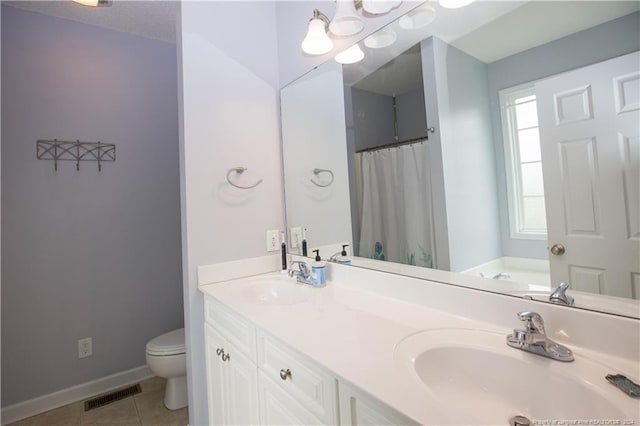 full bathroom featuring a textured ceiling, vanity, plus walk in shower, tile patterned flooring, and toilet