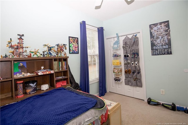 bedroom with carpet and ceiling fan