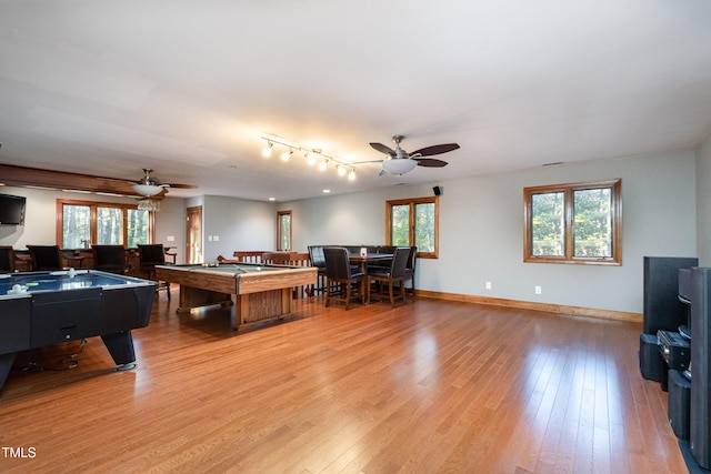 playroom with light hardwood / wood-style floors, ceiling fan, a healthy amount of sunlight, and pool table