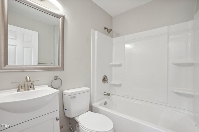 full bathroom with vanity, shower / washtub combination, and toilet