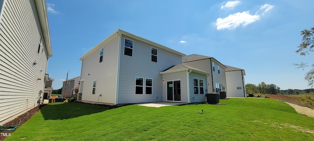 1071 Cherry Stem Rd, Haw River, NC 27258 - rear view of house with a lawn and a patio area