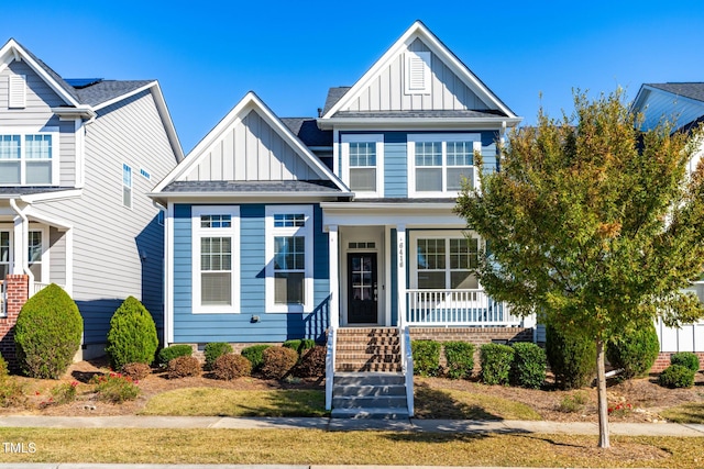 view of front of property featuring covered porch