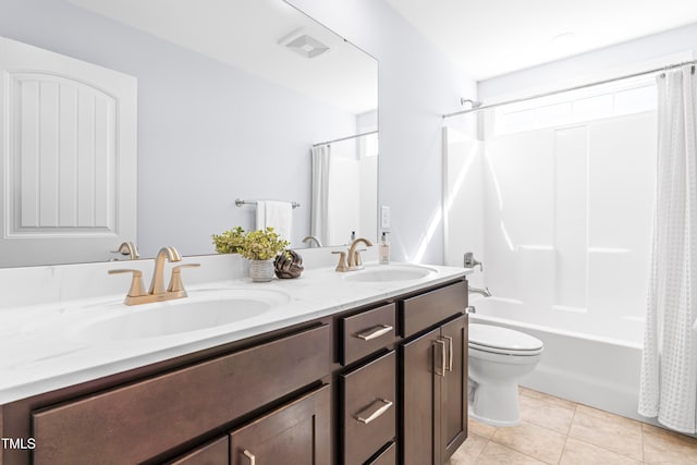 full bathroom with tile patterned floors, vanity, toilet, and shower / tub combo with curtain