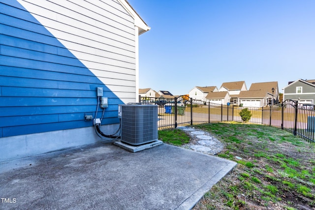 view of yard with a patio area and central AC